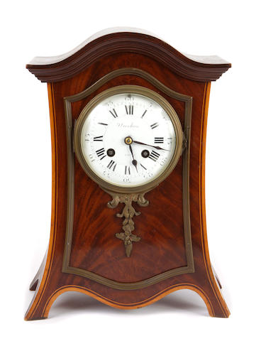 A French inlaid mahogany mantel clock
