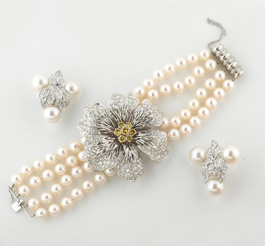 A diamond, colored diamond and cultured pearl bracelet and pair of earrings, Hammerman Bros.