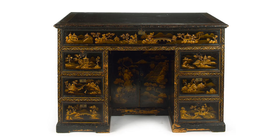 A George III style japanned kneehole desk