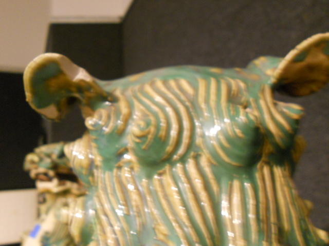 A pair of Chinese glazed ceramic figures of Buddhist lions