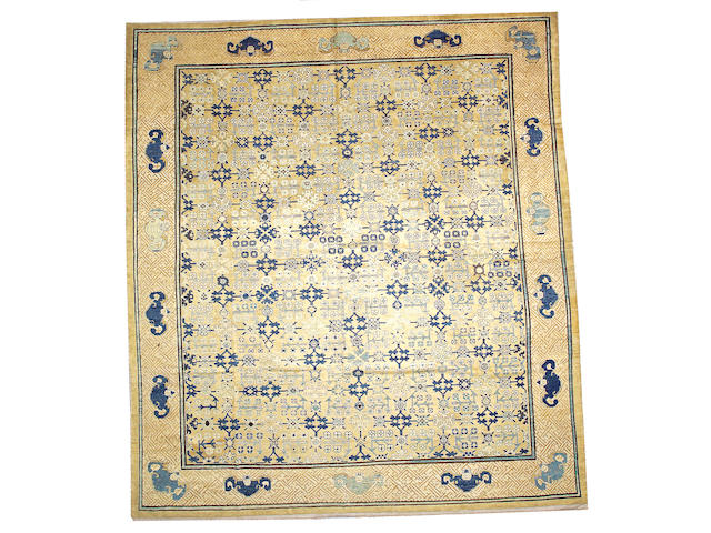 A Chinese carpet with cotton foundation China, size approximately 11ft. 6in.  x 13ft. 2in.