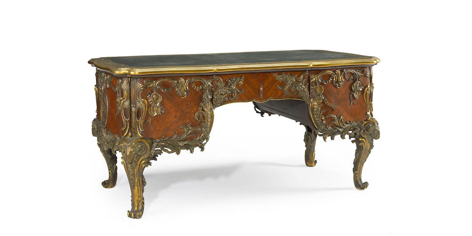 A fine Louis XV style gilt bronze mounted kingwood bureau plat after a model by Gaudreaus possibly by Henry Dasson fourth quarter 19th century