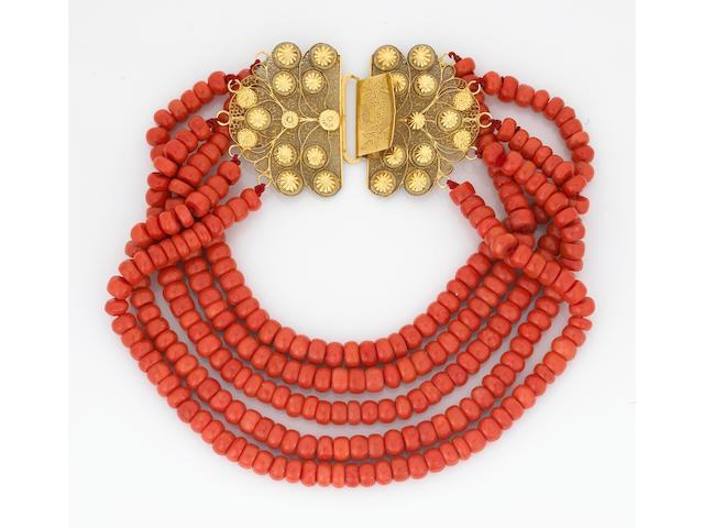 A five-strand coral bead necklace