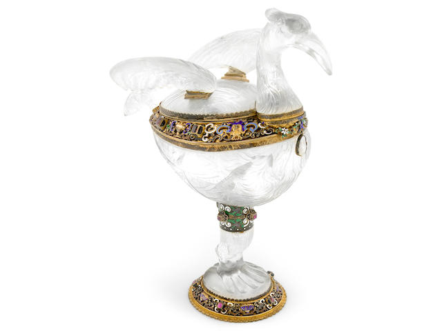 A fine Austrian silver gilt enamel and gem set carved rock crystal covered cup  Maker's mark SG, Vienna, 1886-1922