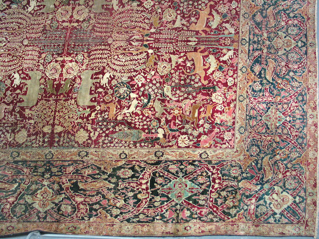 An Agra carpet size approximately 11ft. 4in. x 14ft. 4in.