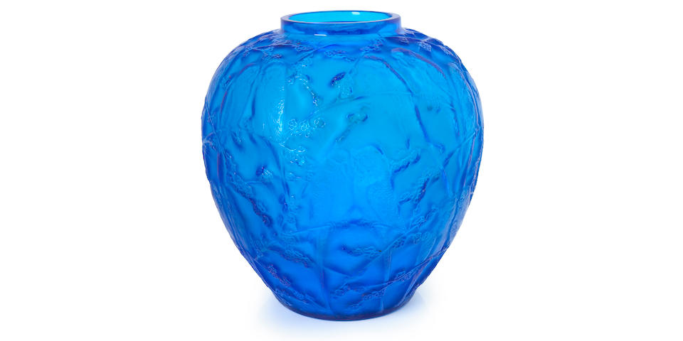 A Ren&#233; Lalique molded electric blue glass vase: Perruches Marchilhac 876, model introduced 1919