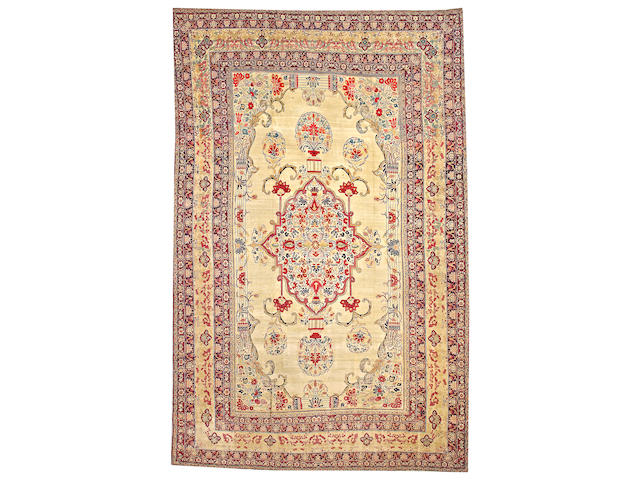 A Kerman carpet South Central Persia size approximately 10ft. 3in. x 16ft. 3in.