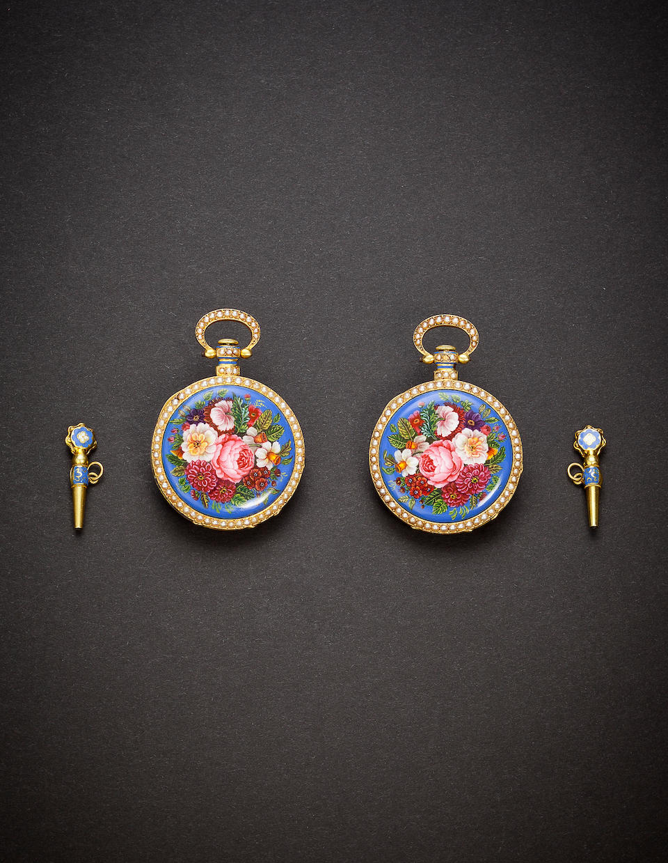 Boyer &#224; Gen&#232;ve. A fine and very rare mirror image pair of floral enameled 18K gold watches in original box with enameled keysNos. 9899 and 9900, circa 1850