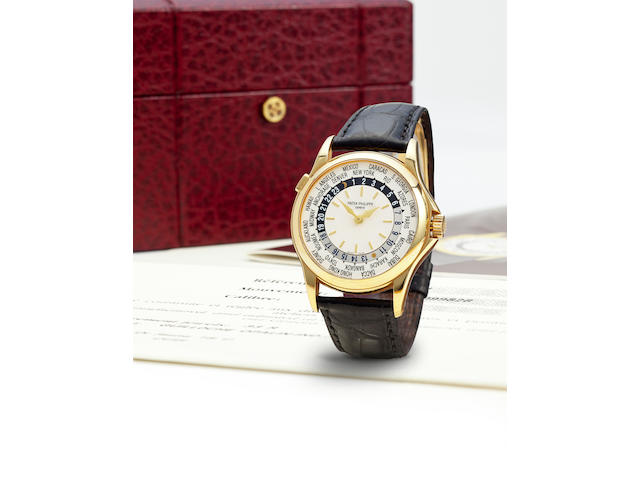 Patek Philippe. A fine 18K gold automatic world time wristwatchRef: 5110J-001, Case no. 4099828, Movement no. 3206243, sold 2001