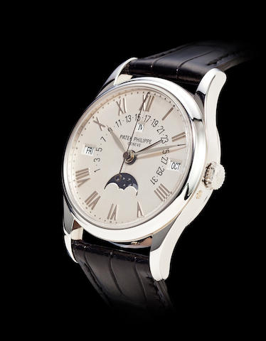 Patek Philippe. A fine and very rare roman numeral dial platinum automatic center seconds wrist watch with retrograde perpetual calendar and moon phasesRef: 5050P, Case No. 2989769, Movement No. 1957953