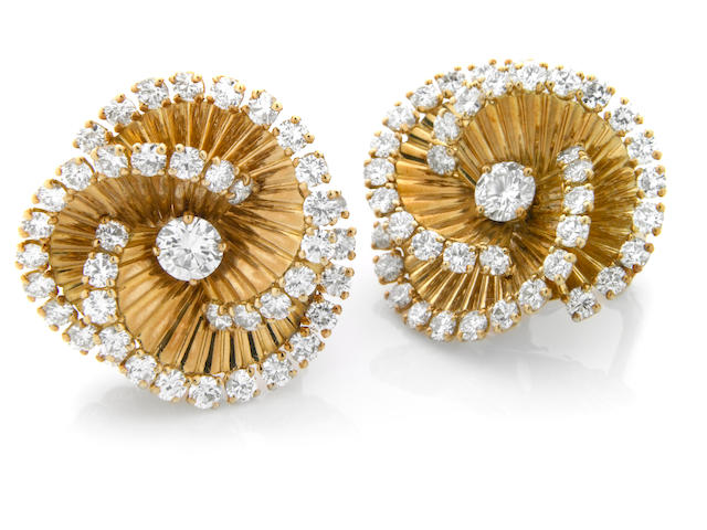 A pair of diamond and eighteen karat gold earrings, French