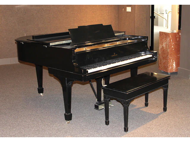 A Steinway & Sons model M ebonized piano