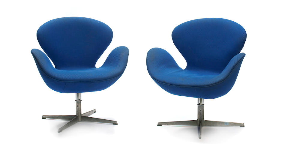 A set of four Arne Jacobsen aluminum and upholstered 'Swan' chairs