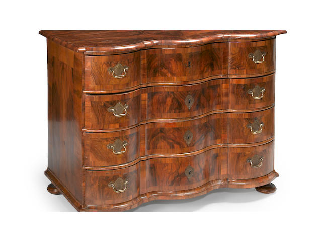 A German Rococo walnut chest of drawers mid 18th century