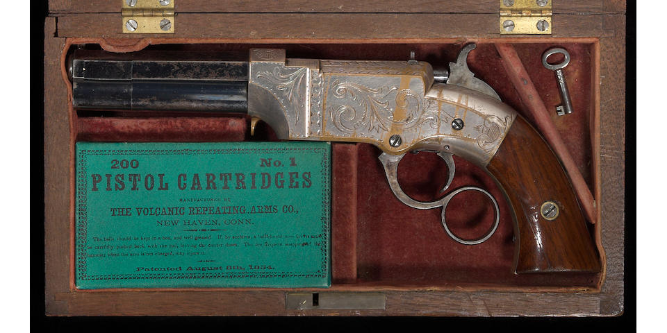 A cased and factory engraved New Haven Arms Volcanic No. 1 lever action pistol