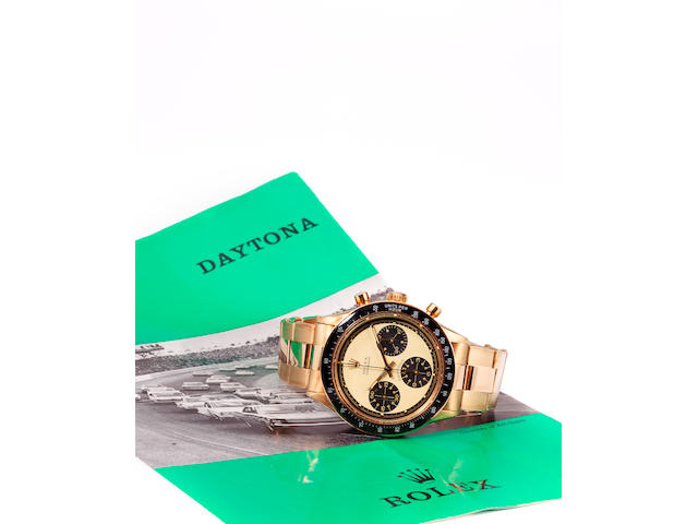 Rolex. A fine and rare 14K gold wrist chronograph and braceletCosmograph Daytona, Paul Newman model, Ref: 6241, Case no. 2084218, sold 1967
