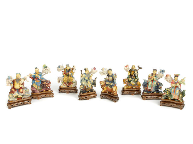 A group of eight small polychrome ivory figures of Immortals