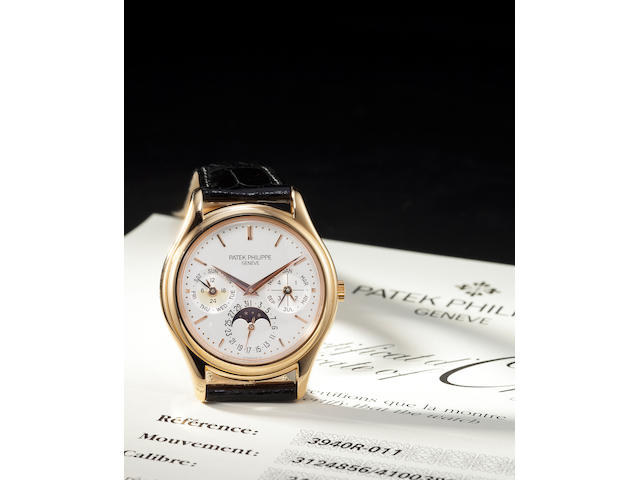 Patek Philippe. A fine 18K rose gold automatic wristwatch with perpetual calendar and moon phasesRef:3940R-011, Case no. 4100389, Movement no. 3124856, sold 2000