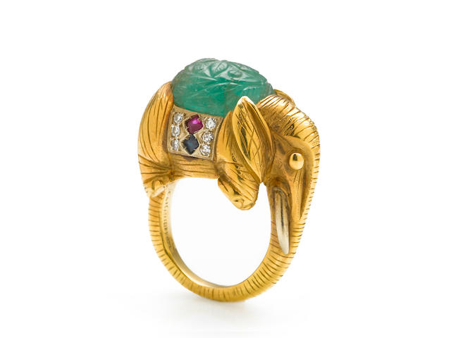 A carved emerald, sapphire, ruby and diamond elephant ring, Cartier, Italy