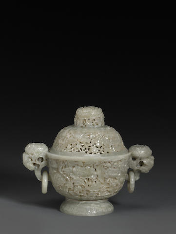 A reticulated greenish-white jade covered censer
