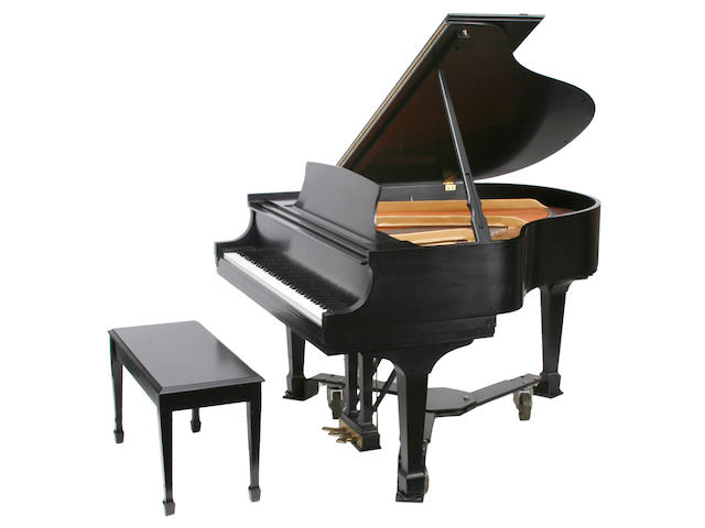 A Steinway and Sons model S ebonized baby grand piano
