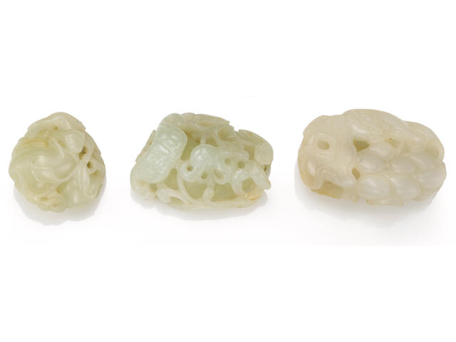 A group of three reticulated nephrite toggles