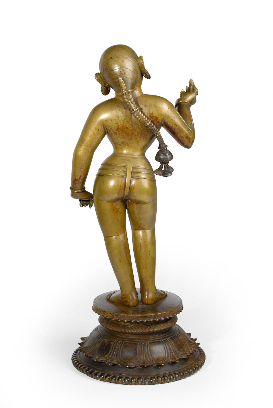A brass figure of Radha Orissa, circa 16th century