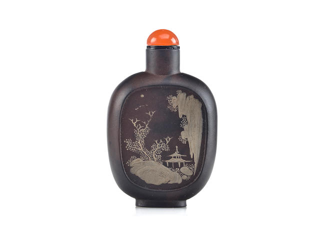 An extremely rare slip decorated Yixing snuff bottle Qianlong mark, 1770-1795