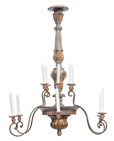 A Baroque style paint decorated twelve light chandelier