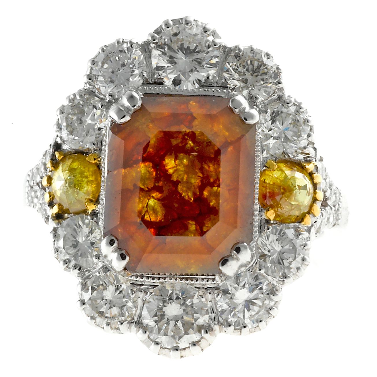 A colored diamond and diamond ring