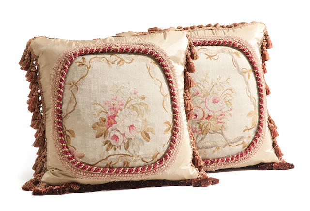 A pair of Aubusson tapestry fragment and silk scatter cushions