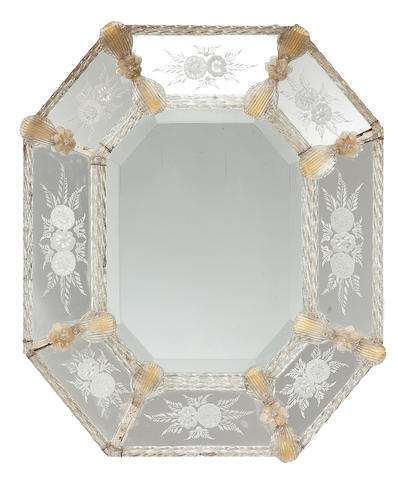 A Venetian acid etched and colored glass mirror of octagonal outline