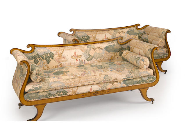 A pair of Regency style satinwood and purpleheart settees 20th century