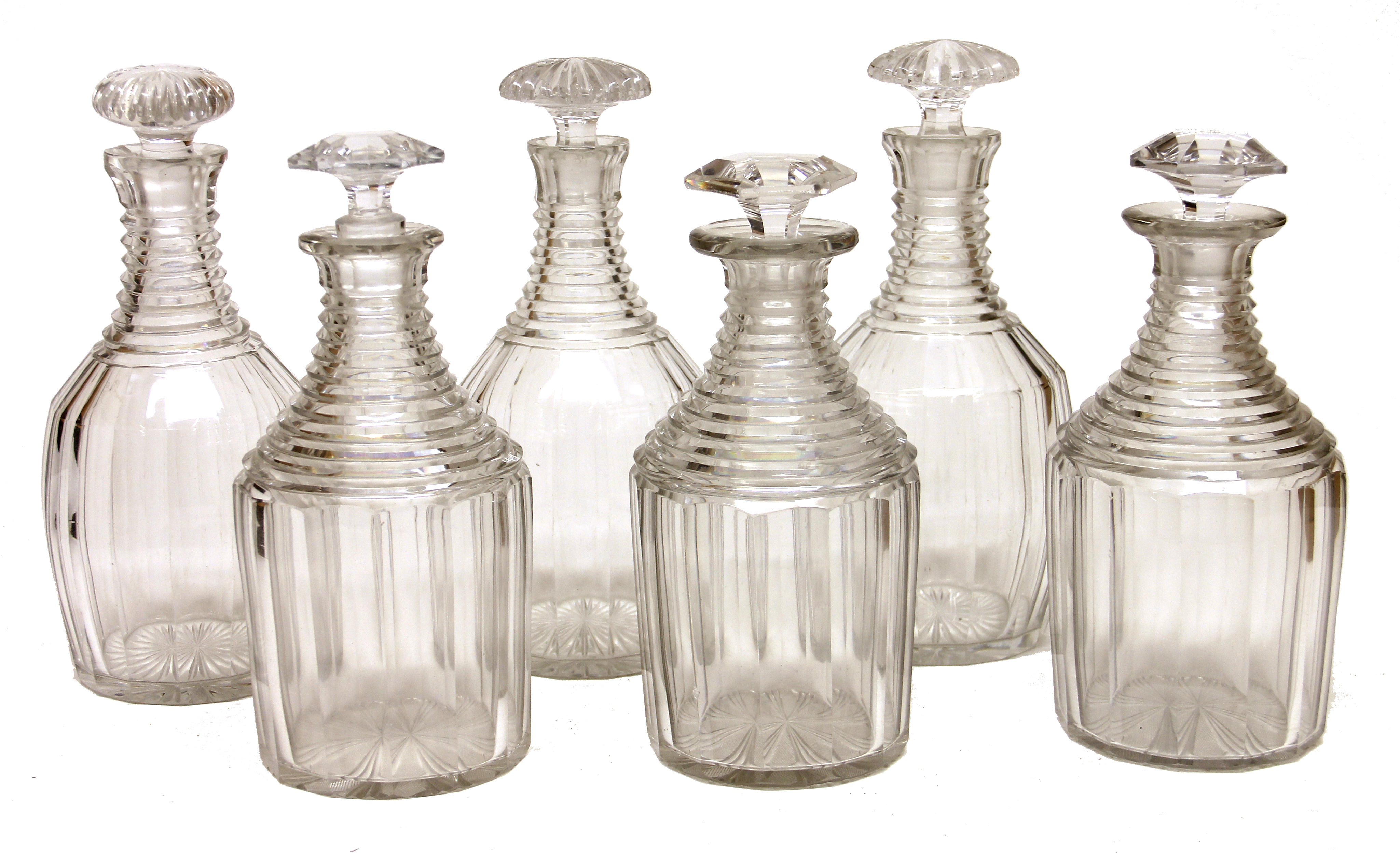 Six George IV glass decanters, six Dutch engraved bottles and group of...
