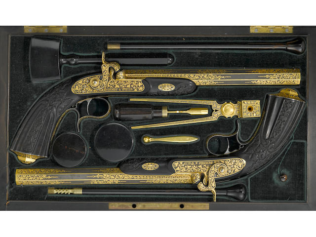 A fine cased pair of gold encrusted French percussion pistols by Devisme