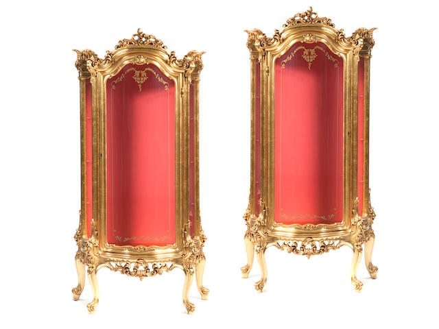 A pair of Louis XV style giltwood vitrines