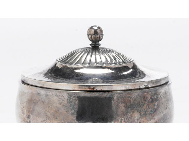 A Danish sterling sugar bowl with cover by Georg Jensen, Copenhagen, designed by Johan Rohde, post 1945  Cosmos, # 45C