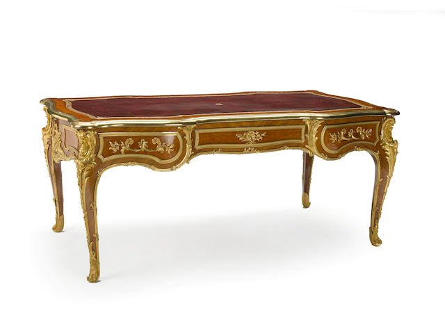 A fine Louis XV style gilt bronze mounted mahogany and kingwood bureau plat <BR />bearing stamp F. Linke<BR />lockplate stamped Duvivier<BR />late 19th century