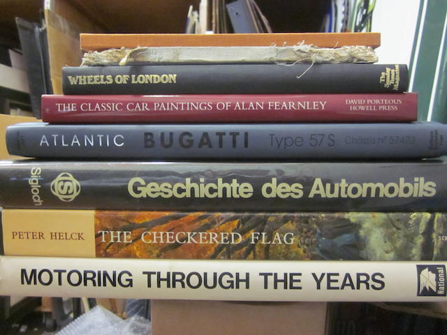 A large lot of books on auto history and art featuring Peter Helcks 'Checkered Flag.'