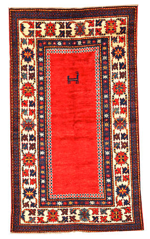 A Kazak rug Caucasus size approximately 4ft. 7in. x 7ft. 10in.