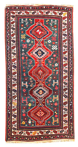 A Kazak rug Caucasus size approximately 4ft. 2in. x 8ft. 2in.