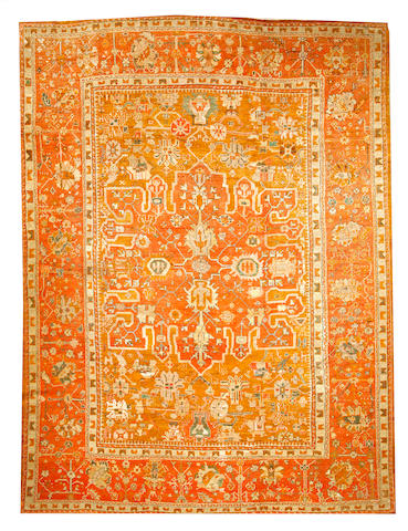 An Oushak carpet West Anatolia size approximately 10ft. 7in. x 14ft. 4in.