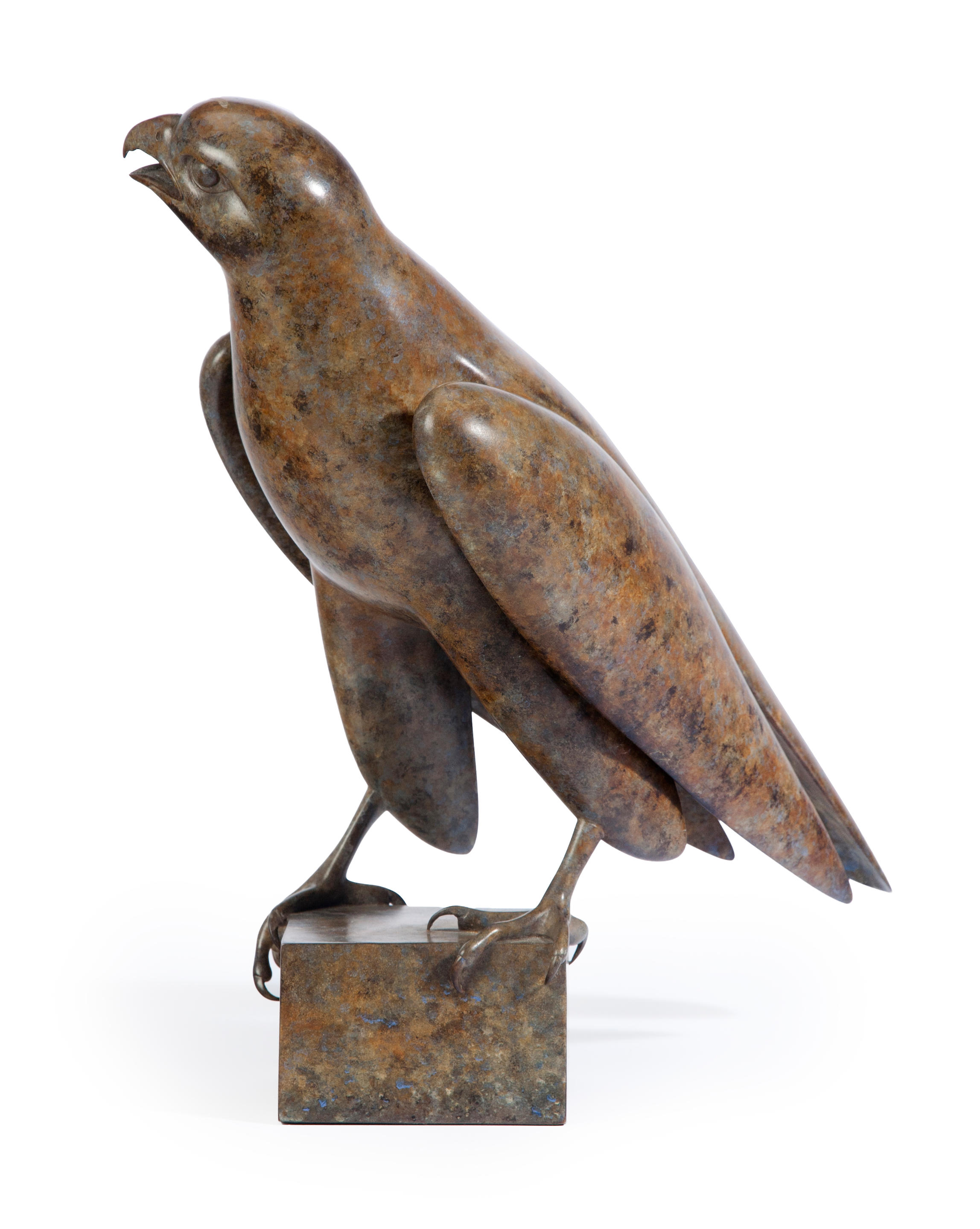 A patinated metal sculpture of a falcon by Geoffrey Dashwood (British, born...