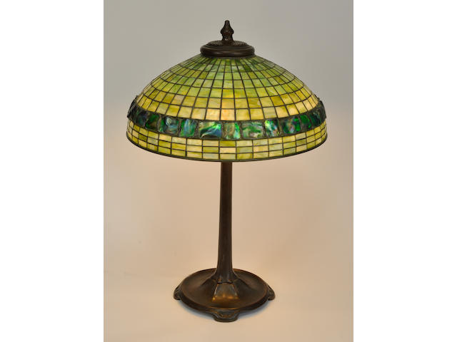 A Tiffany Studios Turtleback tile Favrile glass and patinated bronze green Geometric table lamp first quarter 20th century