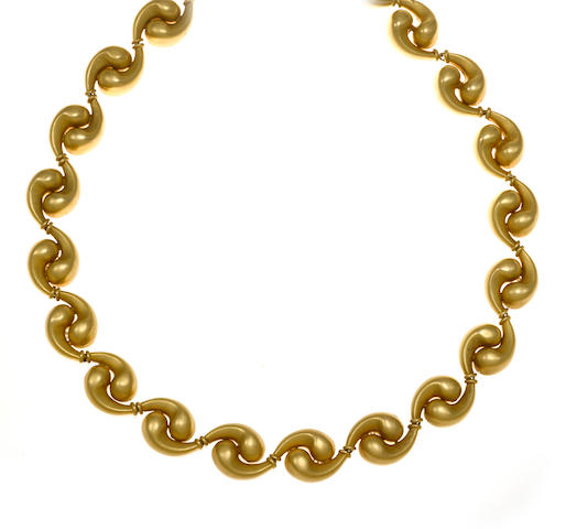 An eighteen karat gold fancy link necklace
