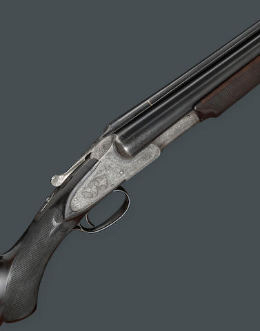 A 12 gauge Hunter Arms L.C. Smith Monogram Grade sidelock ejector shotgun with hang tag and factory letter