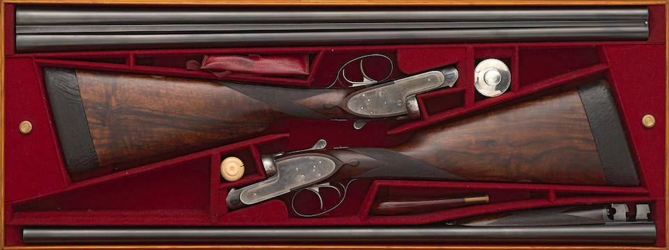A cased pair of 12 gauge self-opening sidelock ejector guns by James Purdey & Sons