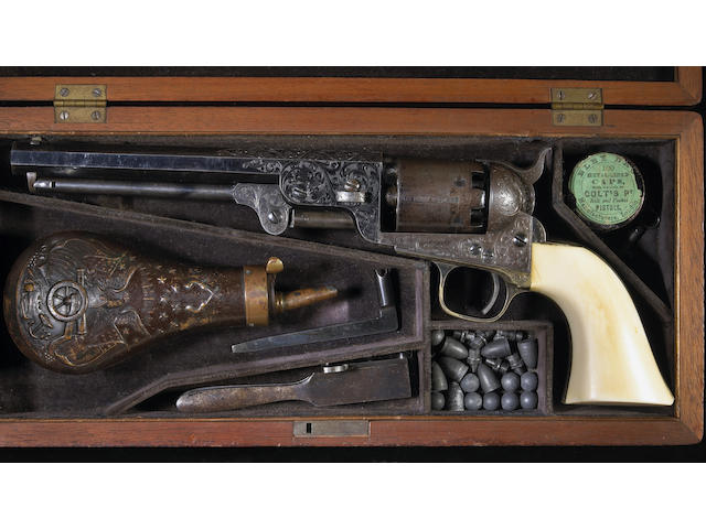 A fine cased Gustave Young engraved Colt Model 1851 Navy revolver