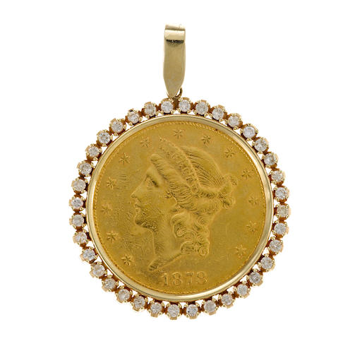 A gold coin and diamond pendant