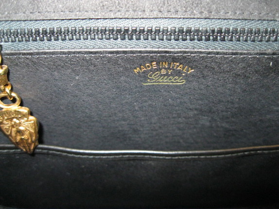 A Gucci black patent leather handbag image 2
